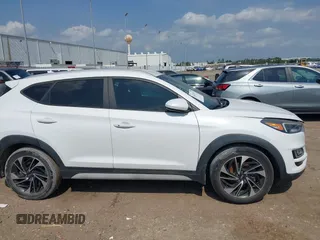 2019 Hyundai Tucson Sport with VIN KM8J33AL1KU861698, listed as a IAAI auction lot 42129173 with 100,160 mi miles. Bid and sale history available at carsss.com. Image 13.