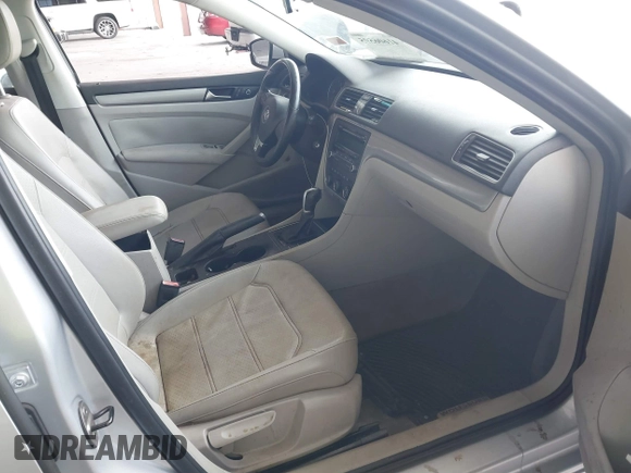 2014 Volkswagen Passat Wolfsburg Edition with VIN 1VWAS7A32EC036193, listed as a IAAI auction lot 41606595 with 77,536 mi miles and . Bid and sale history available at DreamBid. Image 5.