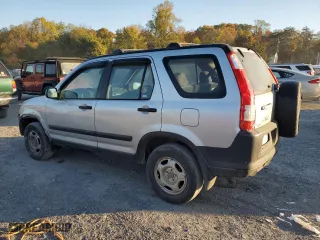 2003 Honda CR-V LX with VIN SHSRD78563U130786, listed as a Copart auction lot 77021604 with 208,065 mi miles and Salvage Title. Bid and sale history available at carsss.com. Image 2.