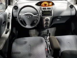 2009 Toyota Yaris with VIN JTDKT903X95231860, listed as a Copart auction lot 51908185 with 135,701 mi miles and Salvage Title. Bid and sale history available at carsss.com. Image 8.