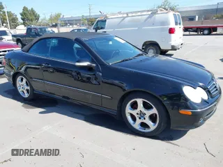 2004 Mercedes-Benz CLK 500 with VIN WDBTK75G14T013879, listed as a IAAI auction lot 41964787 with 114,444 mi miles and . Bid and sale history available at carsss.com. Image 1.