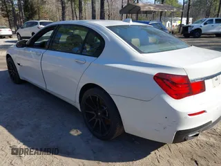 2014 BMW 7 Series 740Li with VIN WBAYE4C59ED138409, listed as a IAAI auction lot 41785423 with 121,687 mi miles. Bid and sale history available at carsss.com. Image 3.