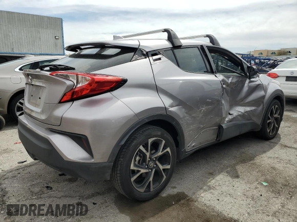 2020 Toyota C-HR LE with VIN JTNKHMBX7L1065098, listed as a Copart auction lot 50101395 with 51,933 mi miles and Salvage Title. Bid and sale history available at DreamBid. Image 3.