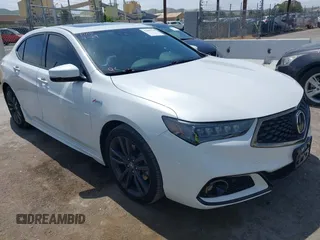 2019 Acura TLX w/A-Spec Pkg z VIN 19UUB2F64KA007468, wystawiony jako IAAI lot #42099728 z przebiegiem 32 007 mil mil oraz . Historia ofert i sprzedaży dostępna na DreamBid. Obrazek 1.