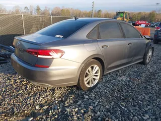 2020 Volkswagen Passat 2.0T S with VIN 1VWAA7A3XLC014300, listed as a IAAI auction lot 41431010 with 145,842 mi miles. Bid and sale history available at carsss.com. Image 4.