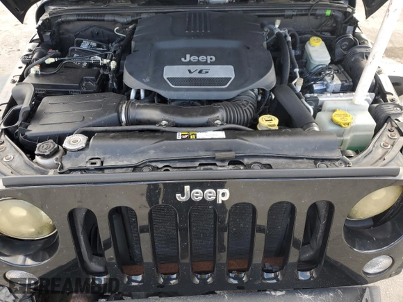 2016 Jeep Wrangler Rubicon with VIN 1C4BJWCG3GL162649, listed as a Copart auction lot 86327414 with 131,407 mi miles and Salvage title. Bid and sale history available at DreamBid. Image 12.