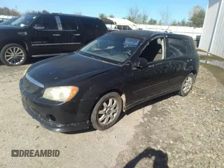 2005 Kia Spectra with VIN KNAFE161955072856, listed as a IAAI auction lot 41767352 with 264,251 mi miles. Bid and sale history available at carsss.com. Image 2.