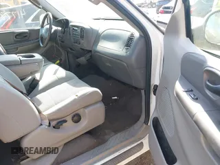 2003 Ford F-150 with VIN 2FTRX17L63CA31923, listed as a IAAI auction lot 41778818 with 107,600 mi miles and . Bid and sale history available at DreamBid. Image 5.