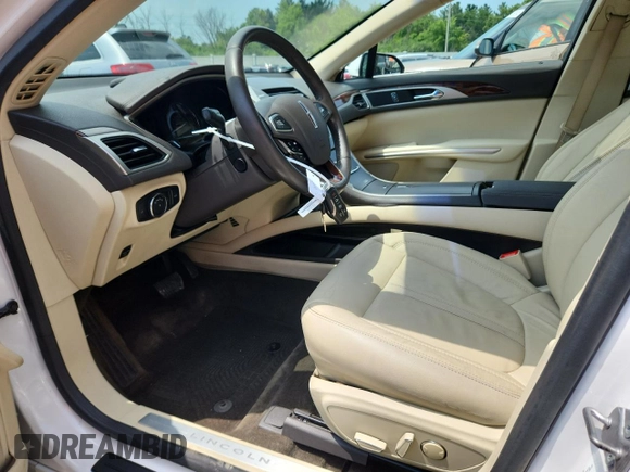 2015 Lincoln MKZ Hybrid z VIN 3LN6L2LU7FR609215, wystawiony jako Copart lot #63211665 z przebiegiem 149 636 mil mil oraz Nie do naprawy • Non repairable. Historia ofert i sprzedaży dostępna na DreamBid. Obrazek 7.