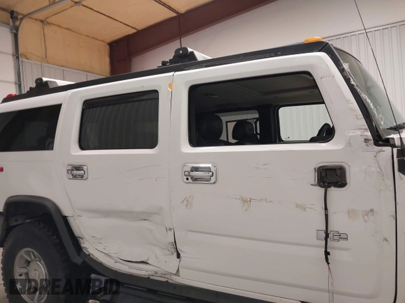 2006 Hummer H2 with VIN 5GRGN23U06H121985, listed as a IAAI auction lot 41336620 with 171,647 mi miles. Bid and sale history available at carsss.com. Image 14.