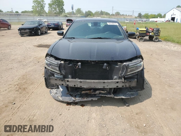 2016 Dodge Charger R/T with VIN 2C3CDXCT4GH303356, listed as a Copart auction lot 59140015 with 128,049 mi miles and Salvage title. Bid and sale history available at DreamBid. Image 5.