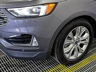 2021 Ford Edge Titanium z VIN 2FMPK3K92MBA53689, wystawiony jako IAAI lot #42501151 z przebiegiem 93 941 mil mil oraz . Historia ofert i sprzedaży dostępna na DreamBid. Obrazek 26.