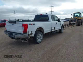 2021 Ford Super Duty F-250 SRW XL with VIN 1FT7X2B65MEC39074, listed as a IAAI auction lot 42086381 with 158,099 mi miles. Bid and sale history available at carsss.com. Image 4.