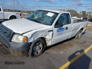 2007 Ford F-150 XL with VIN 1FTRF12W17NA26892, listed as a IAAI auction lot 41011688 with 158,088 mi miles. Bid and sale history available at carsss.com. Image 2.