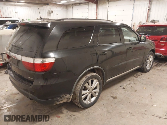 2012 Dodge Durango Crew with VIN 1C4SDJDT6CC205946, listed as a IAAI auction lot 41531175 with 211,372 mi miles and . Bid and sale history available at carsss.com. Image 4.