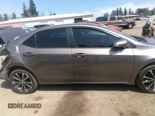 2017 Toyota Corolla L z VIN 2T1BURHE3HC813738, wystawiony jako IAAI lot #37140043 z przebiegiem 240 652 mil mil oraz . Historia ofert i sprzedaży dostępna na DreamBid. Obrazek 13.