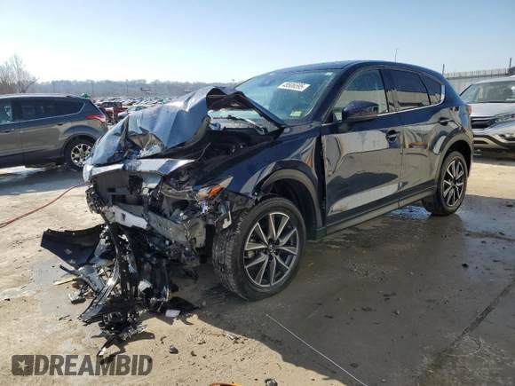 2018 Mazda CX-5 S Premium with VIN JM3KFBDM4J1318254, listed as a Copart auction lot 48506595 with 29,959 mi miles and Salvage Title. Bid and sale history available at DreamBid. Image 1.