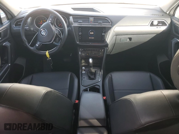 2020 Volkswagen Tiguan SE z VIN 3VV3B7AX6LM107732, wystawiony jako Copart lot #52038695 z przebiegiem 27 317 mil mil oraz Szkoda całkowita • Salvage title. Historia ofert i sprzedaży dostępna na DreamBid. Obrazek 8.