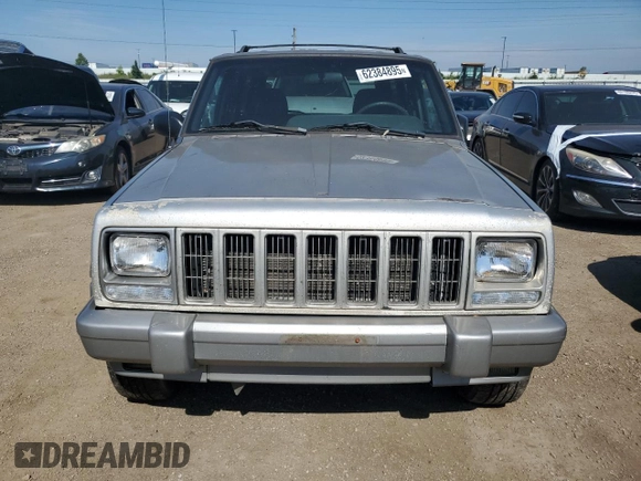 2001 Jeep Cherokee Sport z VIN 1J4FF58S61L540796, wystawiony jako Copart lot #62384895 z przebiegiem 209 294 mil mil oraz Czysty tytuł • Clean title. Historia ofert i sprzedaży dostępna na DreamBid. Obrazek 5.