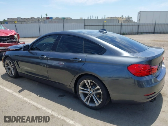2015 BMW 4 Series 428i with VIN WBA4A5C59FG052596, listed as a IAAI auction lot 42649927 with 68,842 mi miles and . Bid and sale history available at DreamBid. Image 14.
