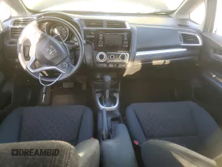 2016 Honda Fit LX with VIN JHMGK5H56GX020324, listed as a Copart auction lot 51052735 with 142,424 mi miles and Salvage Title. Bid and sale history available at carsss.com. Image 8.