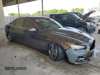2015 Infiniti Q50 with VIN JN1BV7AP4FM335961, listed as a Copart auction lot 61829295 with 130,327 mi miles and Salvage title. Bid and sale history available at DreamBid. Image 4.