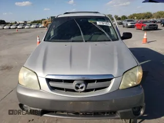 2002 Mazda Tribute LX with VIN 4F2YU09182KM64860, listed as a Copart auction lot 77391824 with 207,965 mi miles and Salvage Title. Bid and sale history available at DreamBid. Image 5.