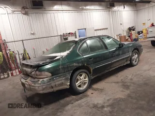 1997 Pontiac Bonneville SE z VIN 1G2HX52KXVH250272, wystawiony jako IAAI lot #41644041 z przebiegiem 160 791 mil mil oraz . Historia ofert i sprzedaży dostępna na DreamBid. Obrazek 4.