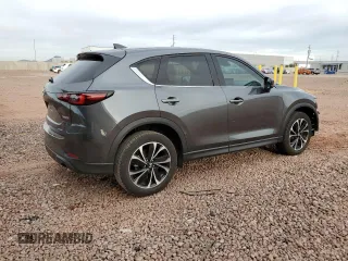 2022 Mazda CX-5 2.5 S Premium Package with VIN JM3KFBDM8N0590642, listed as a Copart auction lot 48996015 with 12,654 mi miles and Salvage Title. Bid and sale history available at carsss.com. Image 3.