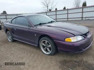 1996 Ford Mustang with VIN 1FALP404XTF174880, listed as a IAAI auction lot 41774122 with 285,302 mi miles. Bid and sale history available at carsss.com. Image 1.