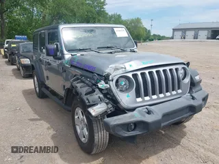 2019 Jeep Wrangler Unlimited Sport S z VIN 1C4HJXDG4KW509864, wystawiony jako IAAI lot #42301275 z przebiegiem 70 706 mil mil oraz . Historia ofert i sprzedaży dostępna na DreamBid. Obrazek 1.