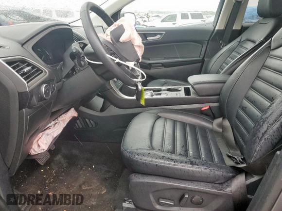 2024 Ford Edge SEL z VIN 2FMPK4J97RBA98092, wystawiony jako Copart lot #52000715 z przebiegiem 23 845 mil mil oraz Szkoda całkowita • Salvage title. Historia ofert i sprzedaży dostępna na DreamBid. Obrazek 7.
