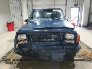 1995 Jeep Cherokee z VIN 1J4FN78S7SL537213, wystawiony jako Copart lot #58700105 z przebiegiem 261 606 mil mil oraz Szkoda całkowita • Salvage title. Historia ofert i sprzedaży dostępna na DreamBid. Obrazek 5.