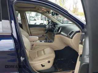 2014 Jeep Grand Cherokee Limited with VIN 1C4RJFBG4EC347208, listed as a IAAI auction lot 41982209 with 124,663 mi miles and . Bid and sale history available at DreamBid. Image 5.