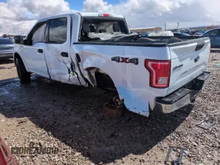 2015 Ford F-150 XLT with VIN 1FTEW1EF5FFB17148, listed as a Copart auction lot 51265215 with 128,011 mi miles and Salvage Title. Bid and sale history available at carsss.com. Image 2.