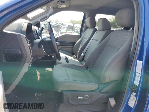 2018 Ford F-150 XL with VIN 1FTEW1EGXJKD26409, listed as a Copart auction lot 59403645 with 122,373 mi miles and Salvage title. Bid and sale history available at DreamBid. Image 7.