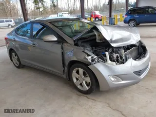 2013 Hyundai Elantra GLS PZEV with VIN KMHDH4AE4DU929923, listed as a IAAI auction lot 41809609 with 76,694 mi miles. Bid and sale history available at carsss.com. Image 1.