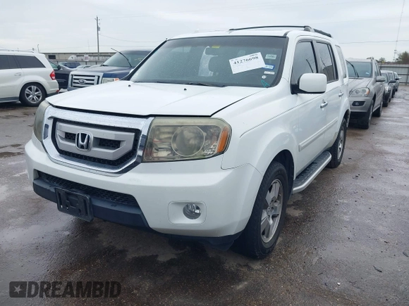 2011 Honda Pilot EX-L with VIN 5FNYF3H67BB014641, listed as a IAAI auction lot 41276698 with 193,656 mi miles and . Bid and sale history available at DreamBid. Image 18.
