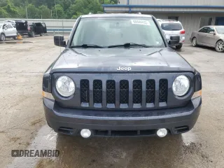 2014 Jeep Patriot Latitude with VIN 1C4NJRFB0ED649779, listed as a Copart auction lot 60444435 with 161,009 mi miles and Salvage title. Bid and sale history available at DreamBid. Image 5.