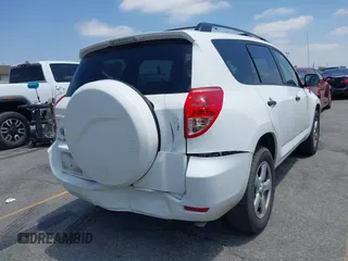 2007 Toyota RAV4 with VIN JTMZK33V875013053, listed as a IAAI auction lot 42133759 with 142,572 mi miles. Bid and sale history available at carsss.com. Image 6.