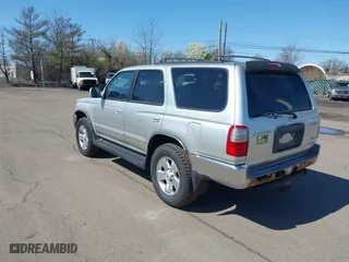 2000 Toyota 4Runner SR5 with VIN JT3HN86R1Y0296588, listed as a IAAI auction lot 42005173 with 177,946 mi miles. Bid and sale history available at carsss.com. Image 3.