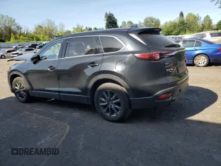 2023 Mazda CX-9 Touring with VIN JM3TCBCY0P0656475, listed as a Copart auction lot 56381365 with 49,716 mi miles and Non repairable. Bid and sale history available at DreamBid. Image 2.