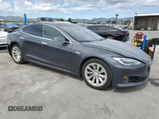 2016 Tesla Model S 70 with VIN 5YJSA1E1XGF149430, listed as a Copart auction lot 51339015 with 104,917 mi miles and Salvage title. Bid and sale history available at DreamBid. Image 4.