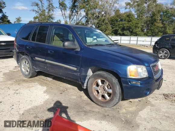 2004 GMC Envoy SLT with VIN 1GKDS13S042311327, listed as a Copart auction lot 42736995 with 235,164 mi miles and Salvage Title. Bid and sale history available at carsss.com. Image 4.