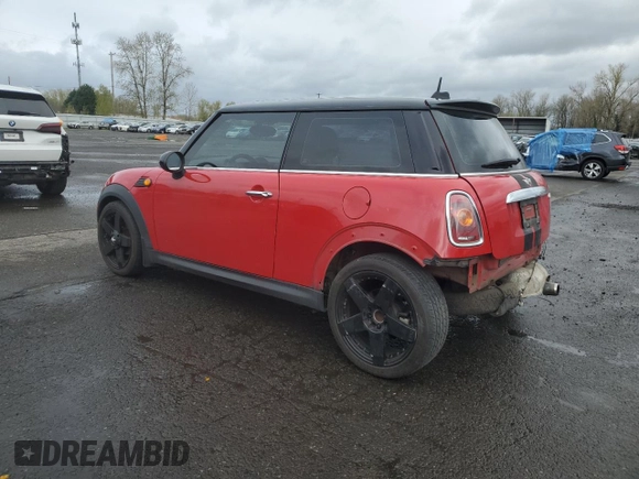 2009 MINI Hardtop with VIN WMWMF33509TU73771, listed as a Copart auction lot 51156025 with 119,622 mi miles and Salvage Title. Bid and sale history available at DreamBid. Image 2.