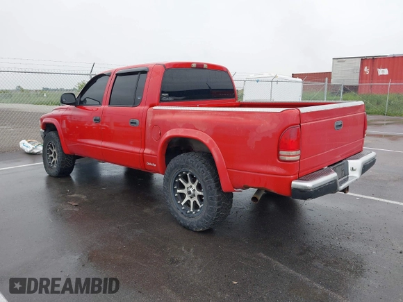 2001 Dodge Dakota Sport z VIN 1B7GG2AN91S110843, wystawiony jako IAAI lot #42316636 z przebiegiem 263 073 mil mil oraz . Historia ofert i sprzedaży dostępna na DreamBid. Obrazek 3.