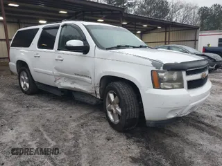 2007 Chevrolet Suburban LT with VIN 1GNFC16J17J187848, listed as a IAAI auction lot 41553241 with 1 mi miles. Bid and sale history available at carsss.com. Image 1.