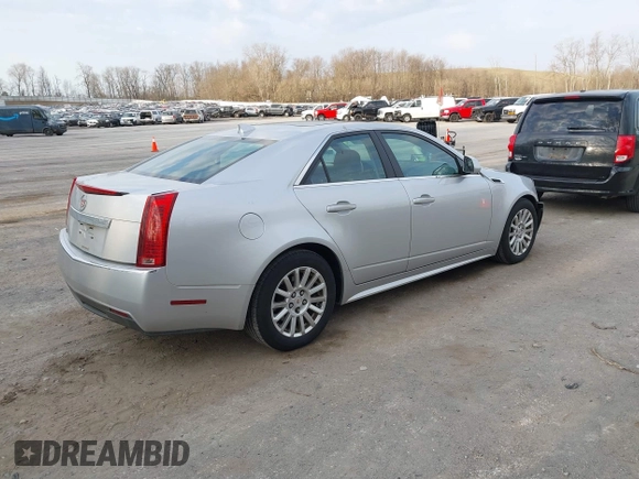 2011 Cadillac CTS Luxury with VIN 1G6DG5EY9B0143057, listed as a IAAI auction lot 42023052 with 72,576 mi miles and . Bid and sale history available at carsss.com. Image 4.