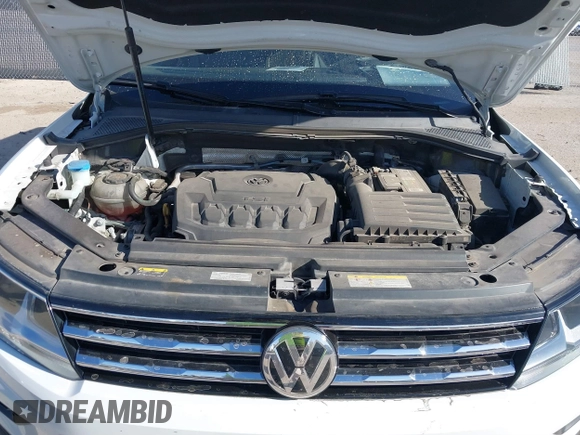 2021 Volkswagen Tiguan SE with VIN 3VV3B7AX9MM051920, listed as a IAAI auction lot 41826721 with 127,699 mi miles and . Bid and sale history available at DreamBid. Image 10.