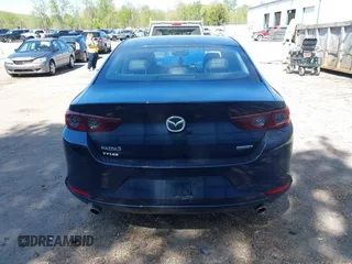 2020 Mazda 3 Select z VIN JM1BPACL2L1165675, wystawiony jako IAAI lot #42232872 z przebiegiem 99 261 mil mil oraz . Historia ofert i sprzedaży dostępna na DreamBid. Obrazek 16.